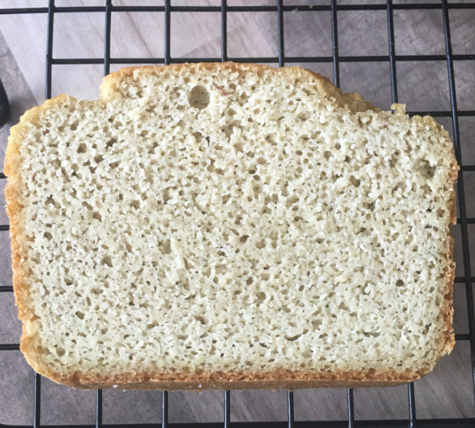 slice of almond flour bread with beautiful air pockets