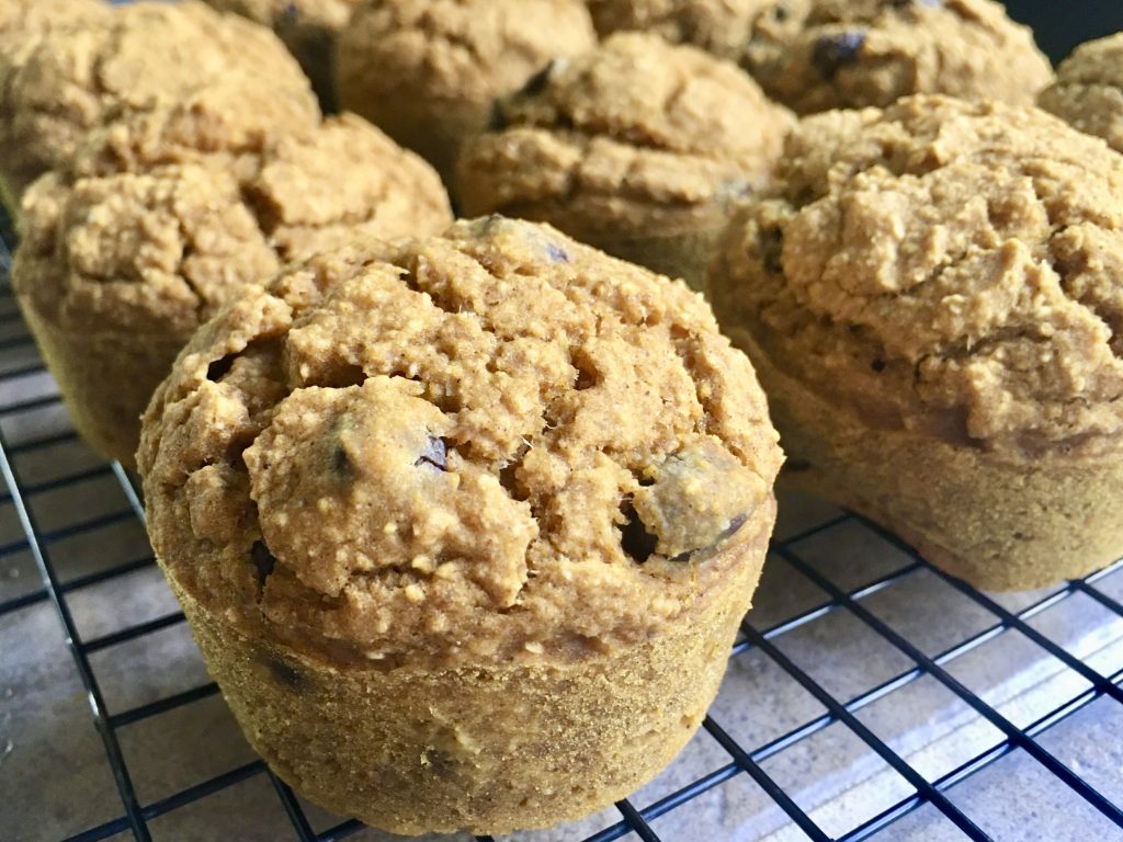 pumpkin oatmeal muffins cooling down on a cooling rack