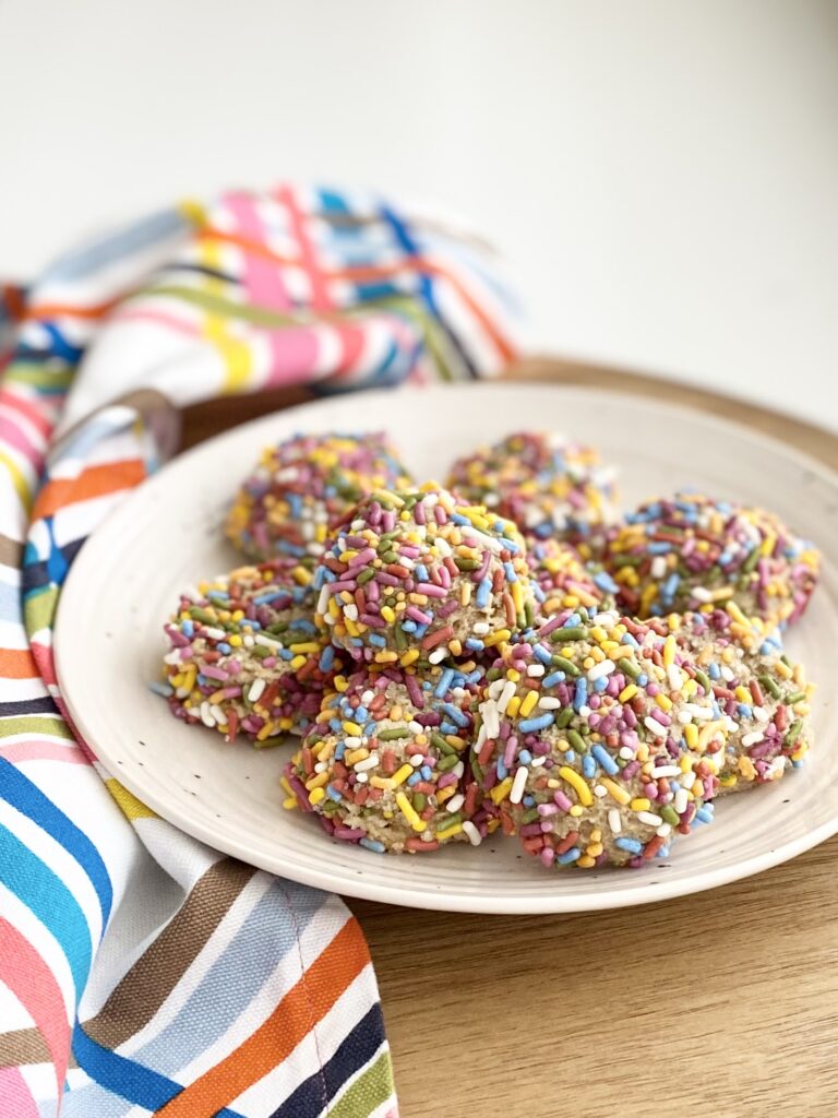 plate of rainbow sprinkle sugar cookies gluten free sugar cookies vegan sugar cookies